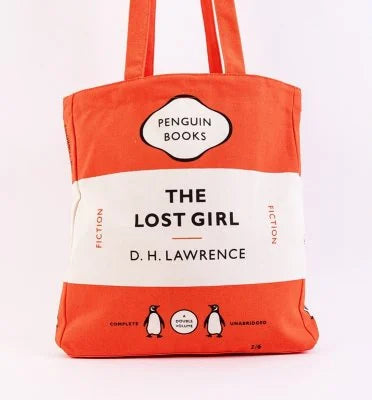 An orange and white canvas tote bag designed to look like the book cover of 'The Lost Girl' by D. H.