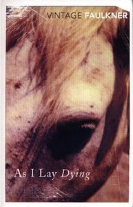 Book cover of 'As I Lay Dying' by William Faulkner featuring a close-up of a horse's face.