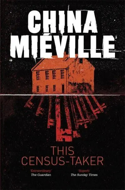 black cover with a red house with keys sticking out below it