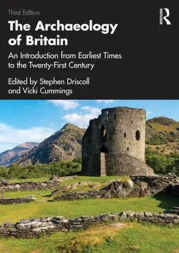 Book cover of 'The Archaeology of Britain' with a castle ruins image on a mountainous landscape.