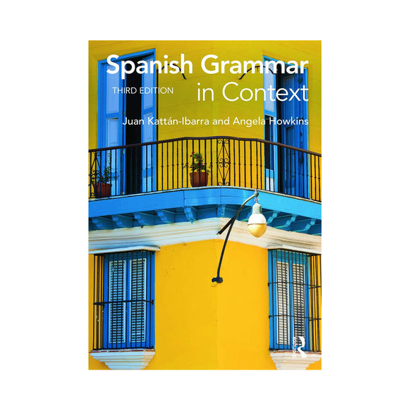 Book cover of 'Spanish Grammar in Context' with colorful building design.