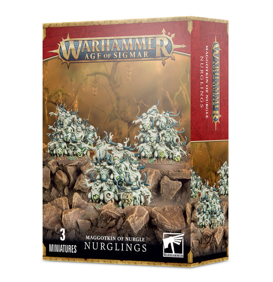 Nurgling models on a rock with orange back ground